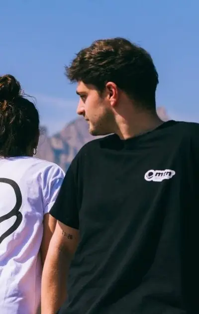 Two people wearing Montana T-shirts
